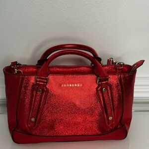 Burberry  Metallic Red Leather Somerford